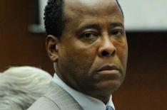 Conrad Murray/AP