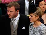 O diretor britnico Guy Ritchie e sua namorada Jacqui Ainsley na chegada ao Casamento Real
