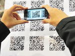 O painel de QR codes que podem ser lidos por smarphones tambm faz sucesso no frum