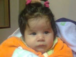 Esta  a Vitria Nina com trs meses.  a alegria da famlia. Isabel.