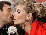 O apresentador Ryan Seacrest com a top Heidi Klum