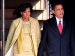 Barack Obama e sua esposa Michelle Obama, quando deixavam a Casa Branca com destino  Igreja St. John
