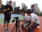 O diretor de fotografia Pablo Chasseraux e o diretor Cristiano Trein junto  cmera no Colgio Anchieta