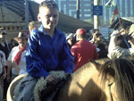 O filho da Fabiele Santos andando a cavalo no Parque da Harmonia 