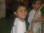 Esse  meu filho Vitor no batismo na troca de cordo da capoeira! Muito orgulhosa mamae te ama 