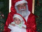 Victor, neto da Andrea, no shopping com o Papai Noel 