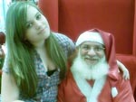 Yasmin, 11 anos, com o Papai Noel no shopping San Pelegrino, em Caxias do Sul 