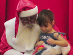 Luiza, de dois anos e sete meses, pedindo uma bicicleta ao Papai Noel.